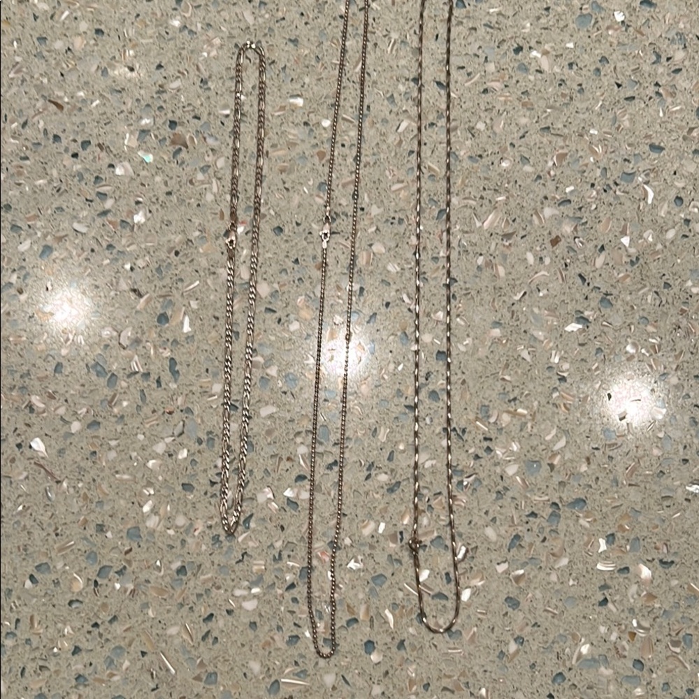 Bundle of (3) stamped 925 sterling silver necklaces. Varying styles and lengths.